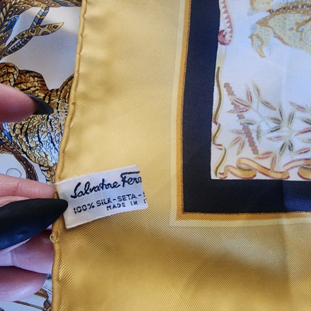 Elegant Salvatore Ferragamo Silk Scarf With Lion Design